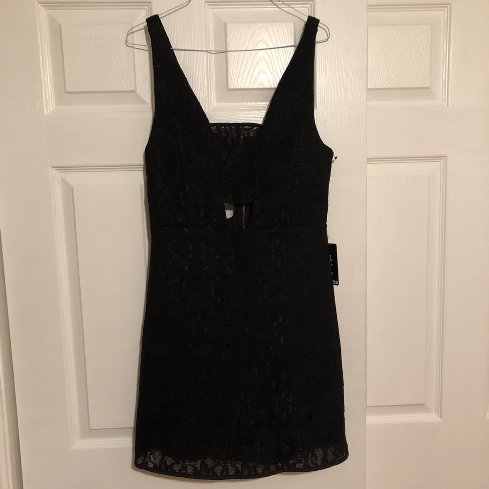 Black dress, cut outs in the front and back